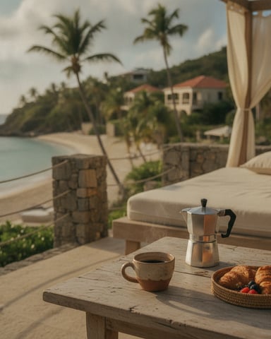 Coastal terrace with coffee, pastries, and ocean view overlooking palm trees and beach villa